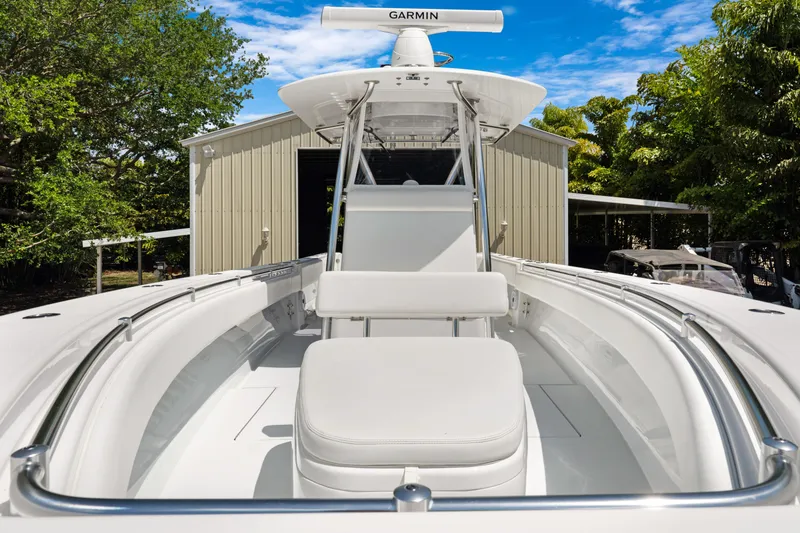 Slide: The Image of 2024 Contender 35 ST boat with sleek design, spacious seating, and advanced Garmin navigation. - 14
