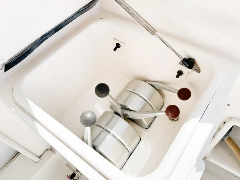 Slide: The Image of Control levers on a 2002 Ocean Yachts 48 Super Sport boat. - 12