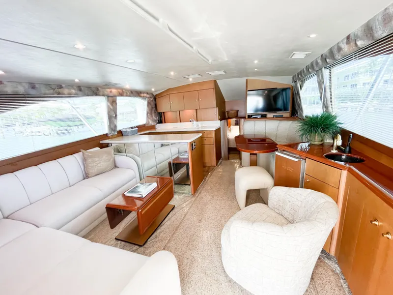 Slide: The Image of Luxurious interior of a 2002 Ocean Yachts 48 Super Sport with elegant seating and modern amenities. - 20