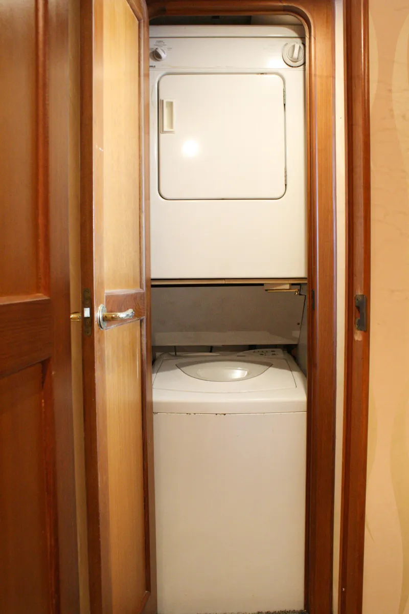 Slide: The Image of Stacked washer and dryer in 2002 Ocean Yachts 48 Super Sport. - 34