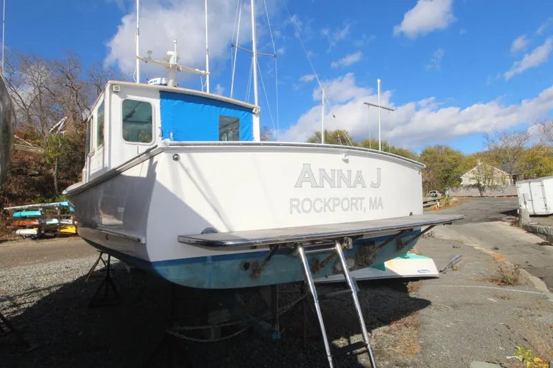 Slide: The Image of Holland 32 boat named "Anna J" in Rockport, MA, 2020 model, on dry land. - 6