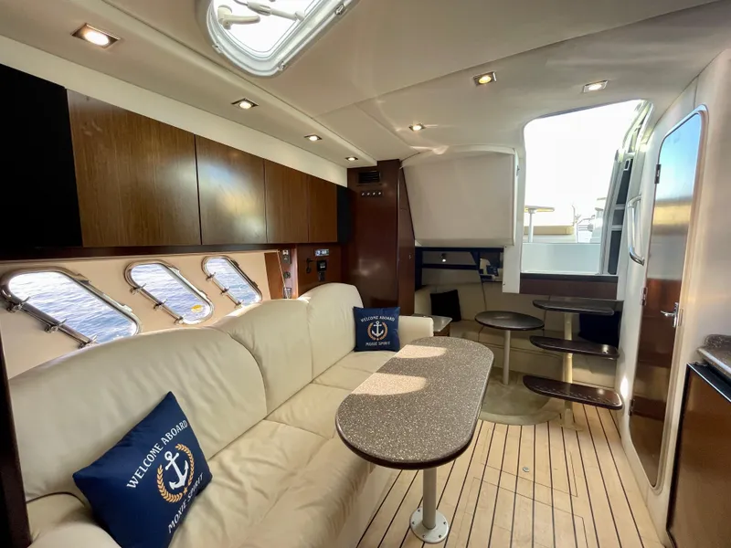 Slide: The Image of Luxurious interior of 2012 Cruisers Yachts 35 Express with elegant seating and modern design. - 13