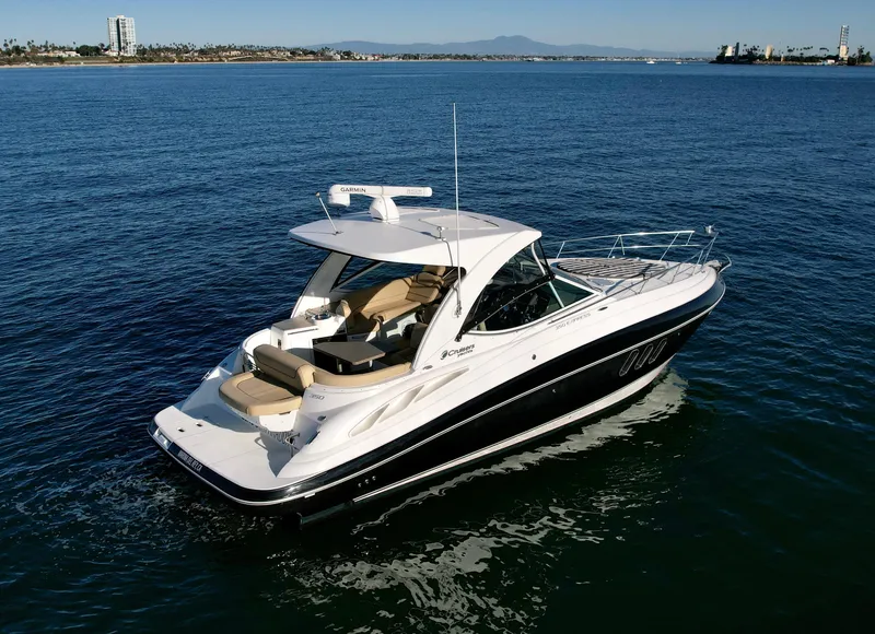 Slide: The Image of 2012 Cruisers Yachts 35 Express on open water, showcasing sleek design and luxury features. - 3