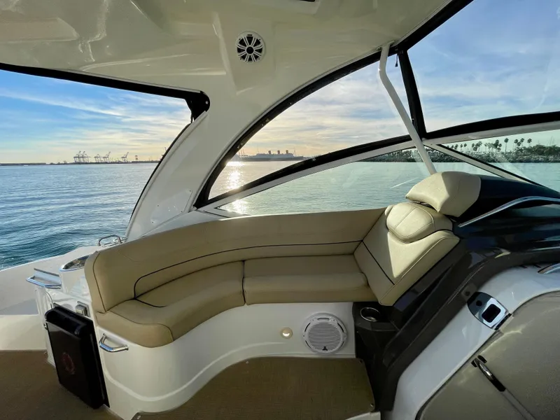 Slide: The Image of 2012 Cruisers Yachts 35 Express interior with ocean view and comfortable seating. - 45