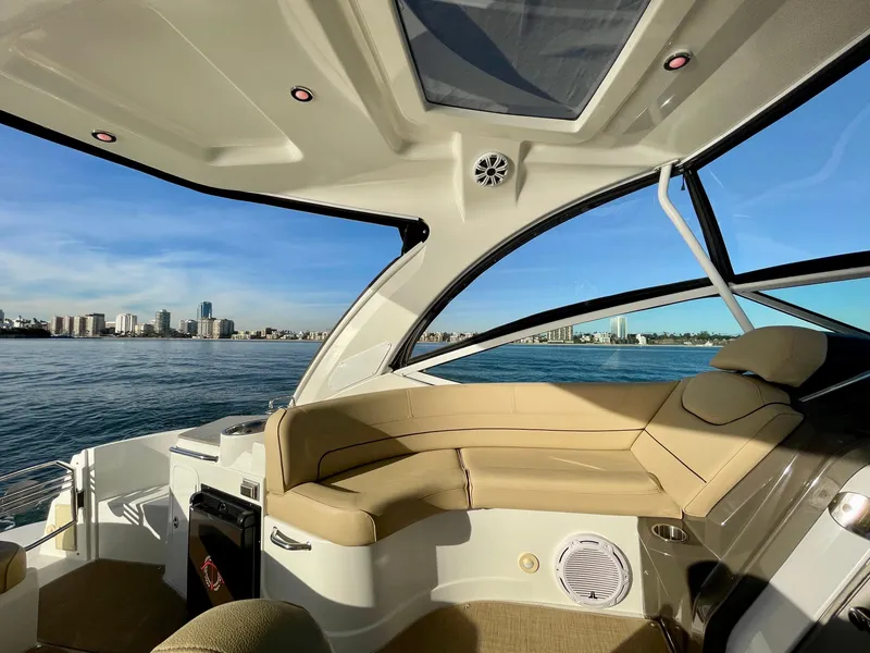 Slide: The Image of Luxurious 2012 Cruisers Yachts 35 Express interior with city skyline view. - 49