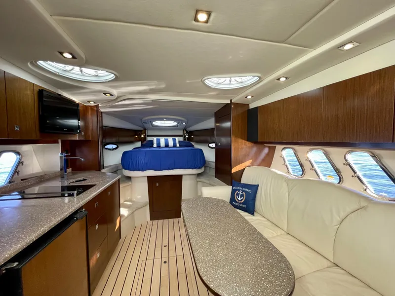 Slide: The Image of Luxurious interior of 2012 Cruisers Yachts 35 Express with modern amenities and elegant design. - 8