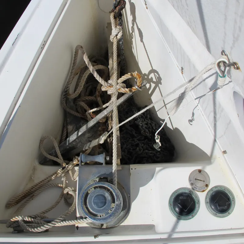 Slide: The Image of Anchor locker of 2007 Catalina 387 sailboat with ropes and winch. - 16