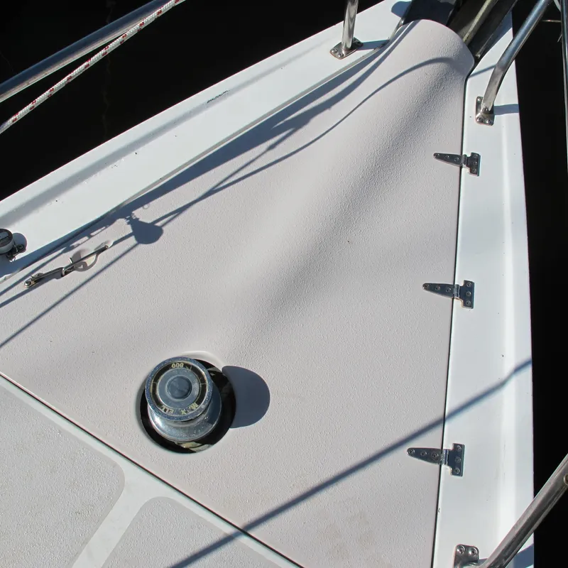 Slide: The Image of Deck of 2007 Catalina 387 sailboat with winch and railing. - 17