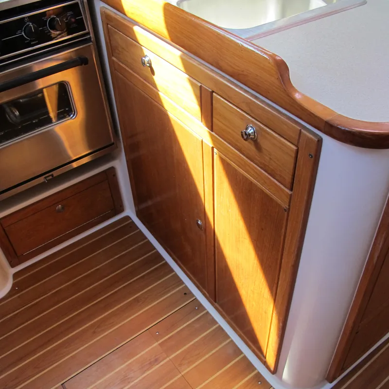 Slide: The Image of Wooden cabinetry and stainless steel oven in 2007 Catalina 387 yacht kitchen. - 47