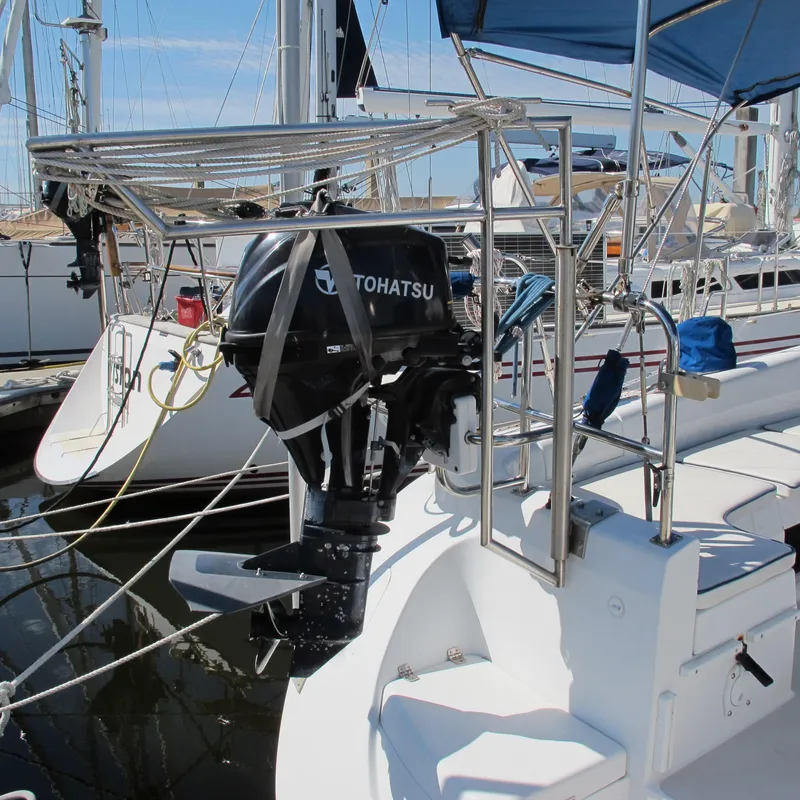 Slide: The Image of Catalina 387 sailboat with Tohatsu outboard motor, docked in marina, 2007 model. - 9