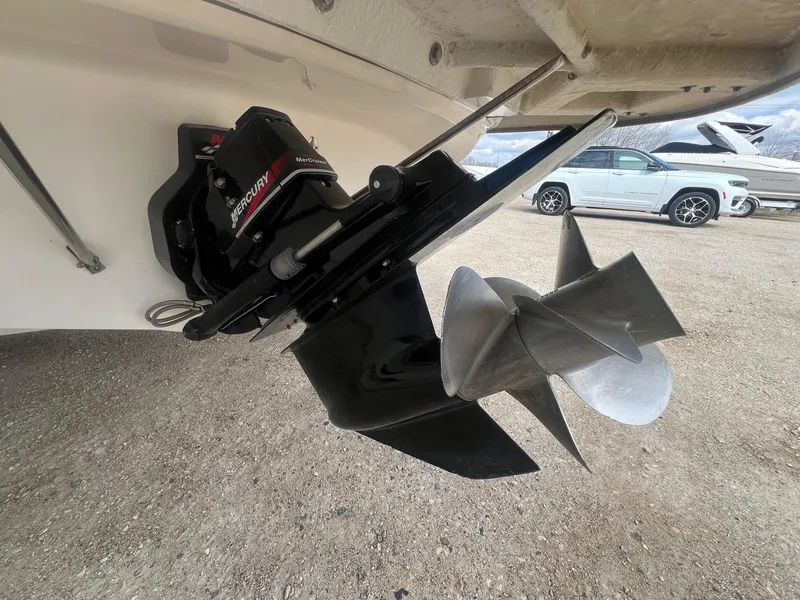 Slide: The Image of Close-up of a 2002 Maxum 2300 SR boat's Mercury outdrive and propeller. - 7