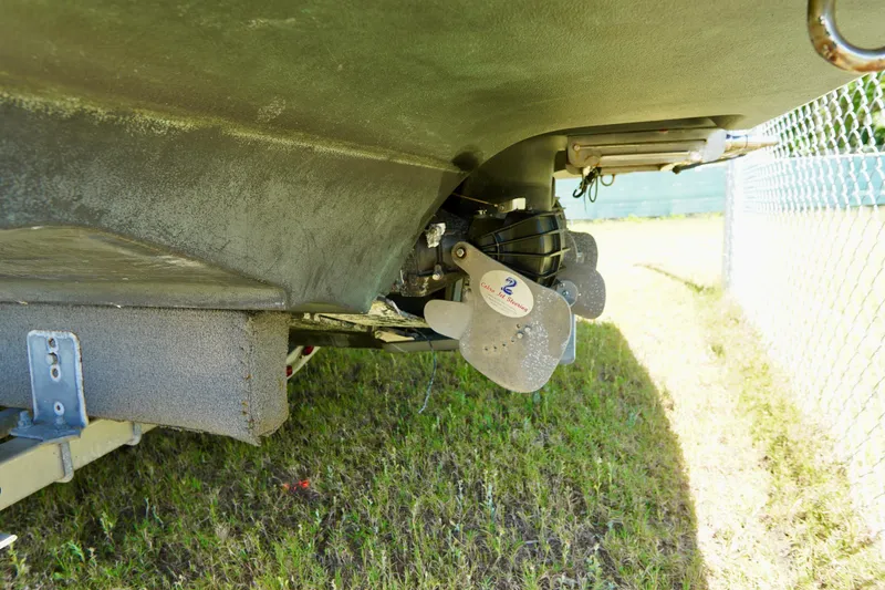 Slide: The Image of 2015 Yamaha Boats 242 Limited S underside view, showcasing propeller and hull details. - 34