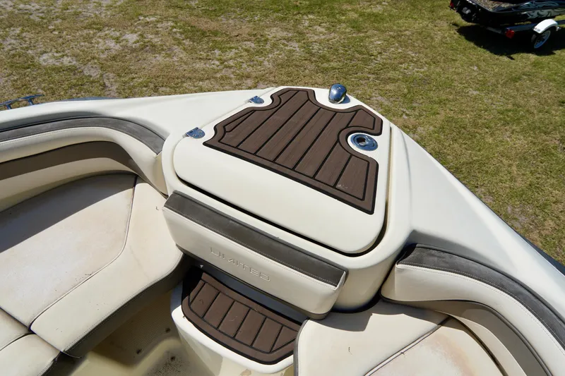 Slide: The Image of 2015 Yamaha Boats 242 Limited S bow seating with brown and beige upholstery. - 5