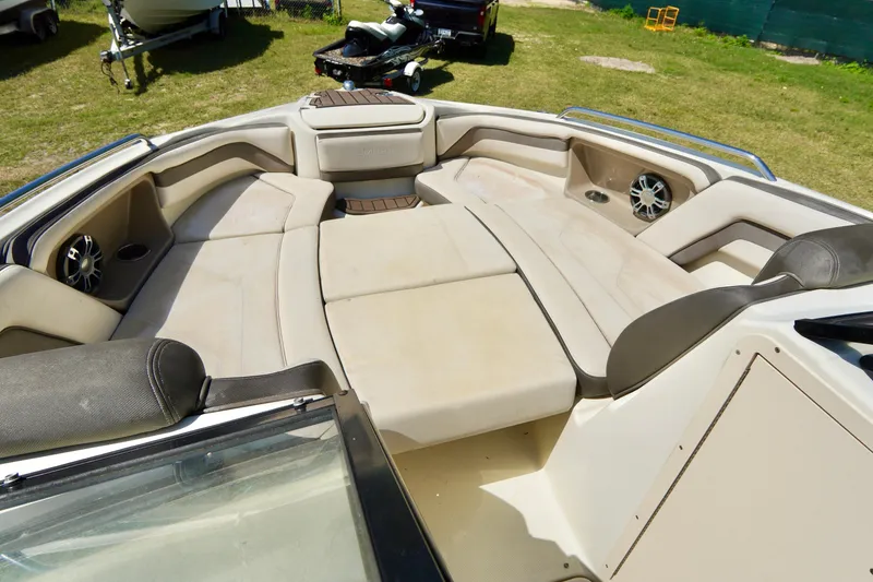 Slide: The Image of 2015 Yamaha Boats 242 Limited S interior with spacious seating and modern design. - 8