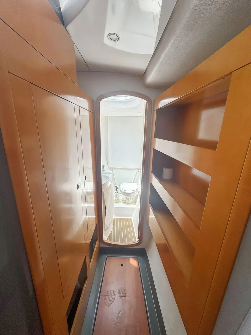Slide: The Image of 2005 Fountaine Pajot HIGHLAND yacht kitchen with a modern stainless steel stove. - 26