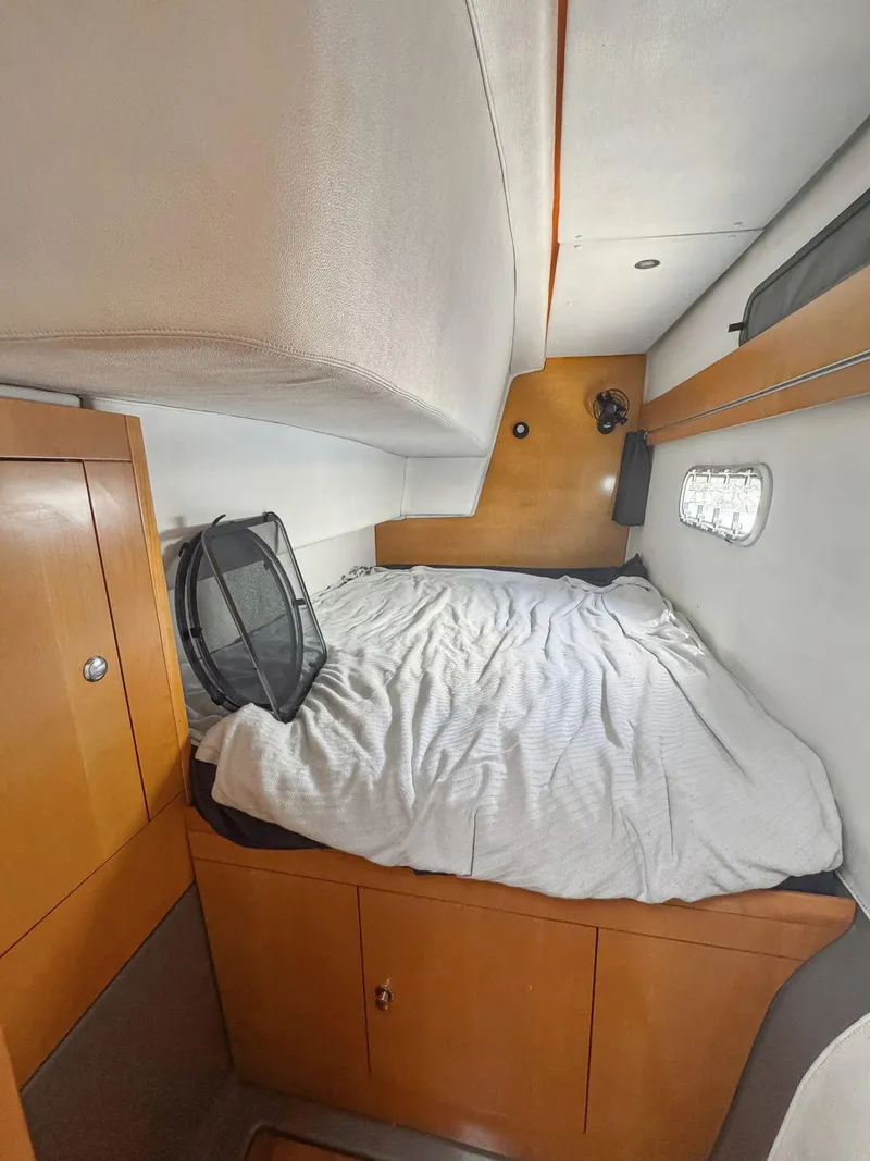 Slide: The Image of Compact bathroom in 2005 Fountaine Pajot HIGHLAND yacht with sink, toilet, and mirror. - 36