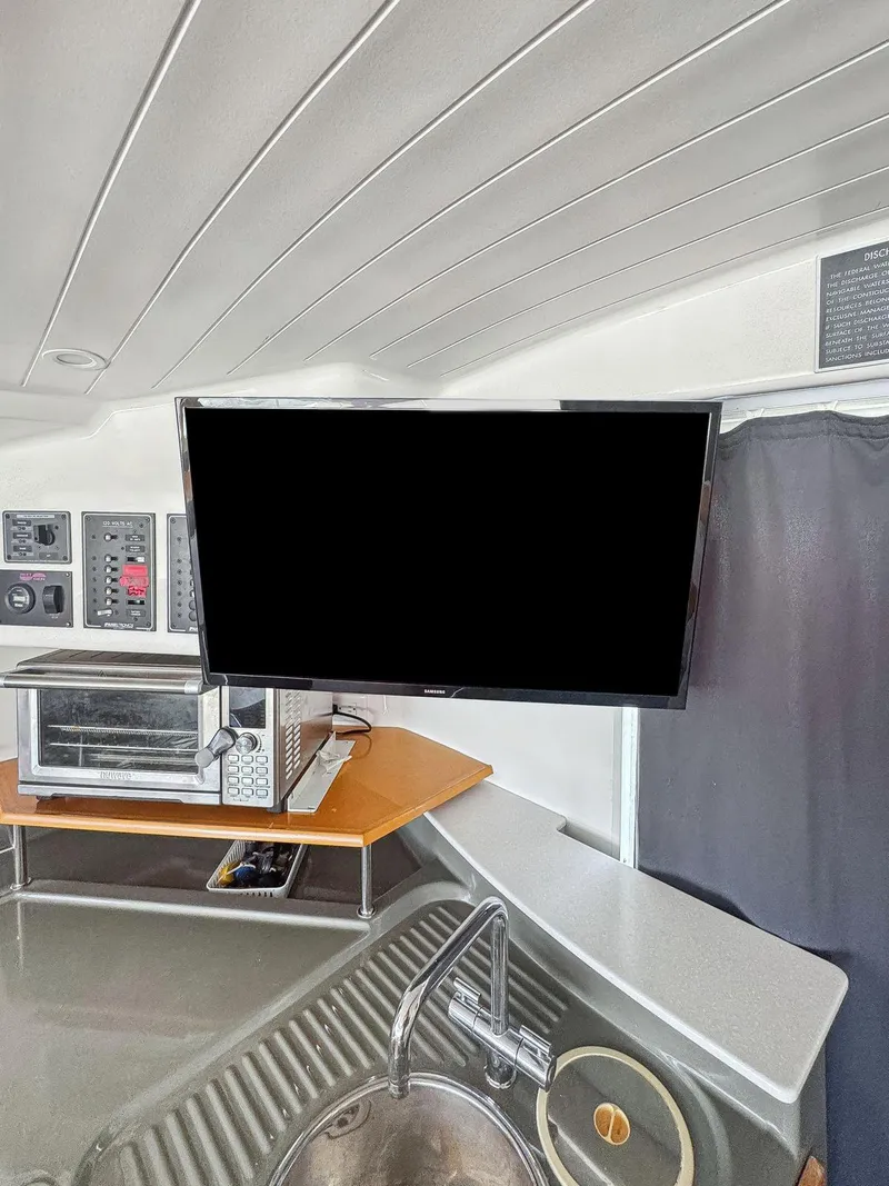 Slide: The Image of Electrical panel on a 2005 Fountaine Pajot HIGHLAND boat, featuring 120 volts AC switches. - 30