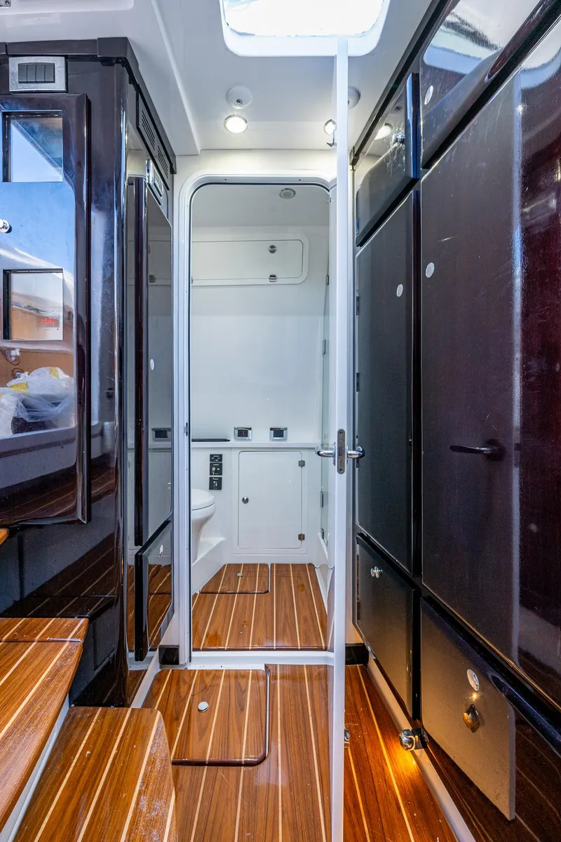 Slide: The Image of Interior of 2020 HCB 53 yacht with wooden flooring and modern design. - 11