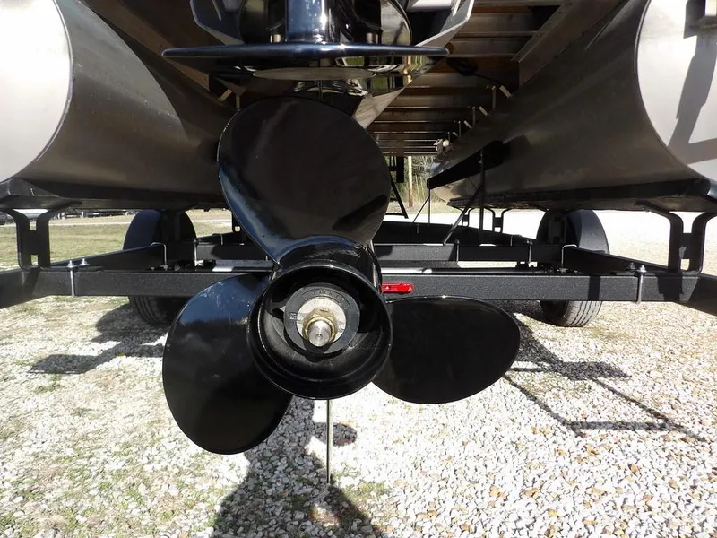 Slide: The Image of 2023 Bennington 20 SVSR pontoon boat propeller and trailer close-up. - 28