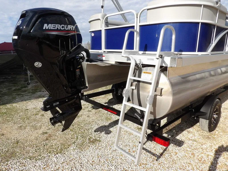 Slide: The Image of 2023 Bennington 20 SVSR pontoon boat with Mercury outboard motor and boarding ladder. - 29