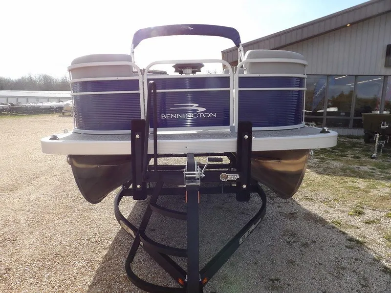 Slide: The Image of 2023 Bennington 20 SVSR pontoon boat on a trailer, front view. - 3