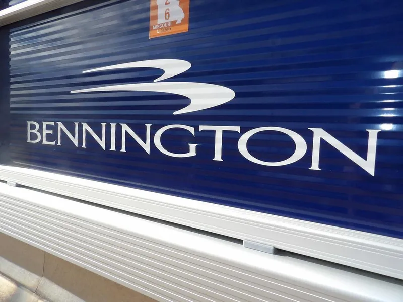 Slide: The Image of 2023 Bennington 20 SVSR boat logo on blue background. - 31