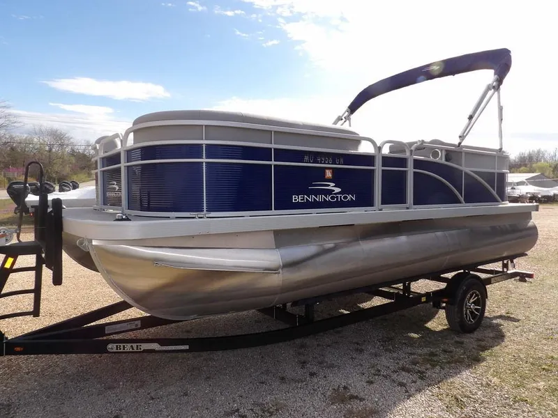 Slide: The Image of 2023 Bennington 20 SVSR pontoon boat on trailer, side view. - 5