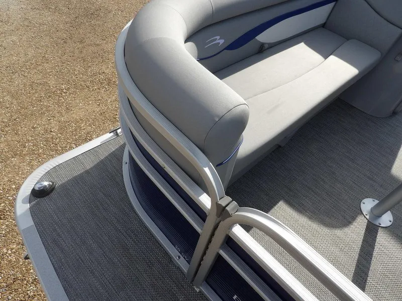 Slide: The Image of 2023 Bennington 20 SVSR pontoon boat with gray seating and carpeted deck. - 8