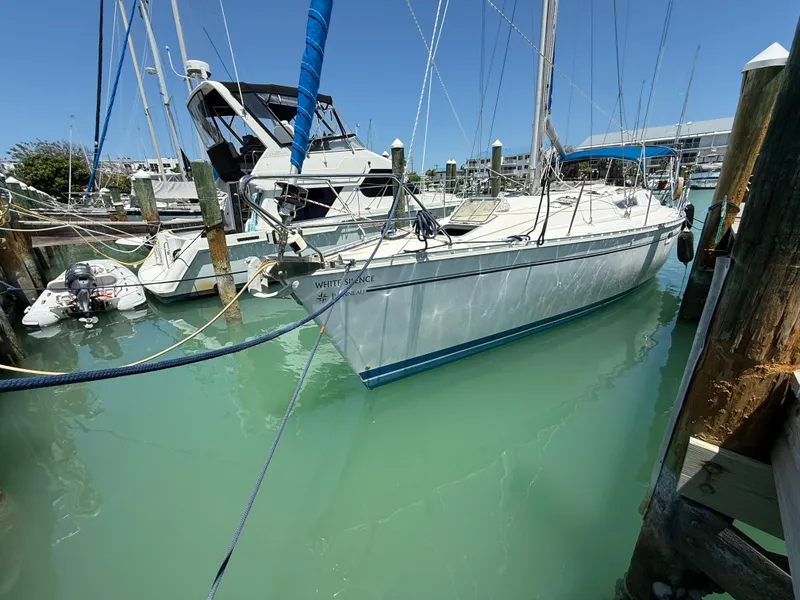 Slide: The Image of Jeanneau Sun Odyssey 42.2 sailboat docked in marina, 1998 model. - 7