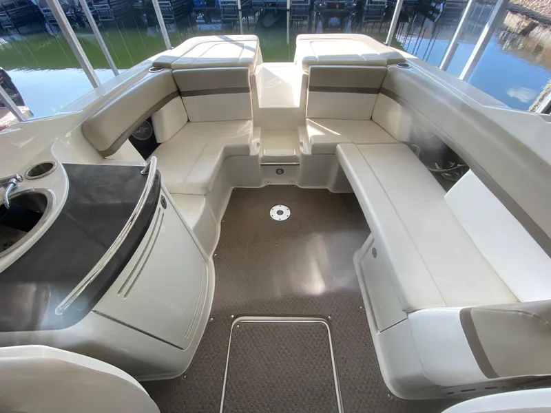 Slide: The Image of Interior of 2012 Sea Ray 270 SLX boat with spacious seating and sleek design. - 17