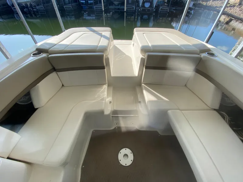 Slide: The Image of Interior view of a 2012 Sea Ray 270 SLX boat with spacious seating. - 18