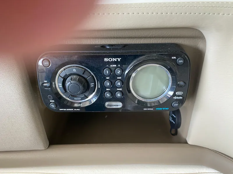 Slide: The Image of Sony marine stereo system in a 2012 Sea Ray 270 SLX boat. - 29