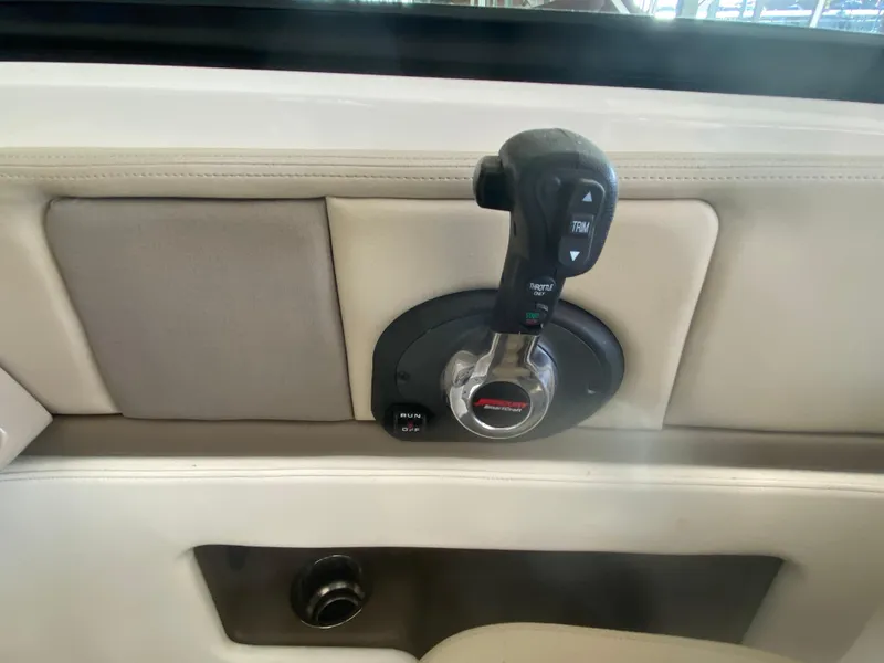 Slide: The Image of Throttle control of 2012 Sea Ray 270 SLX boat, featuring ergonomic design and controls. - 35