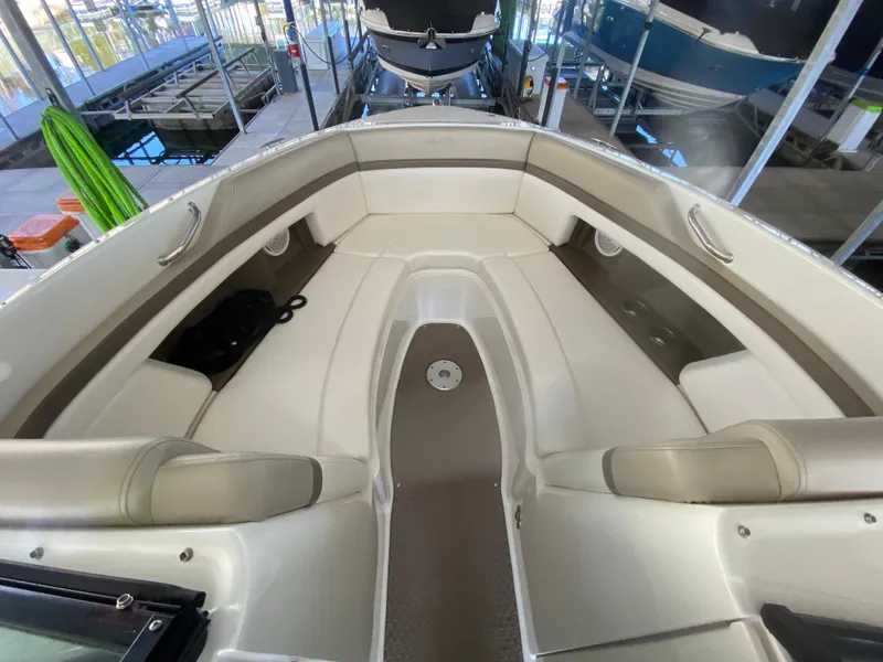 Slide: The Image of Interior view of 2012 Sea Ray 270 SLX boat with spacious seating. - 38