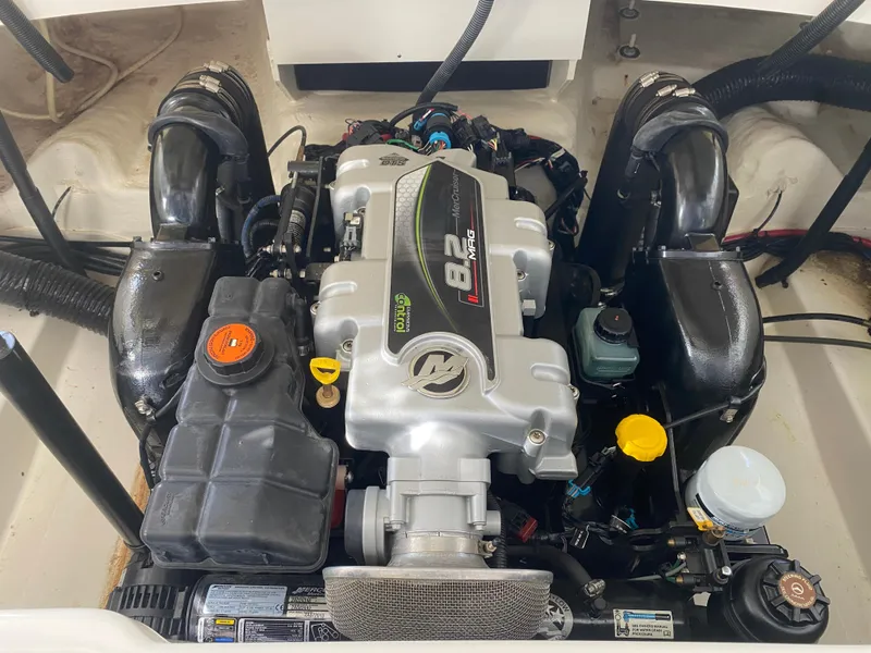 Slide: The Image of Engine compartment of a 2012 Sea Ray 270 SLX boat, featuring a powerful 8.2L engine. - 45