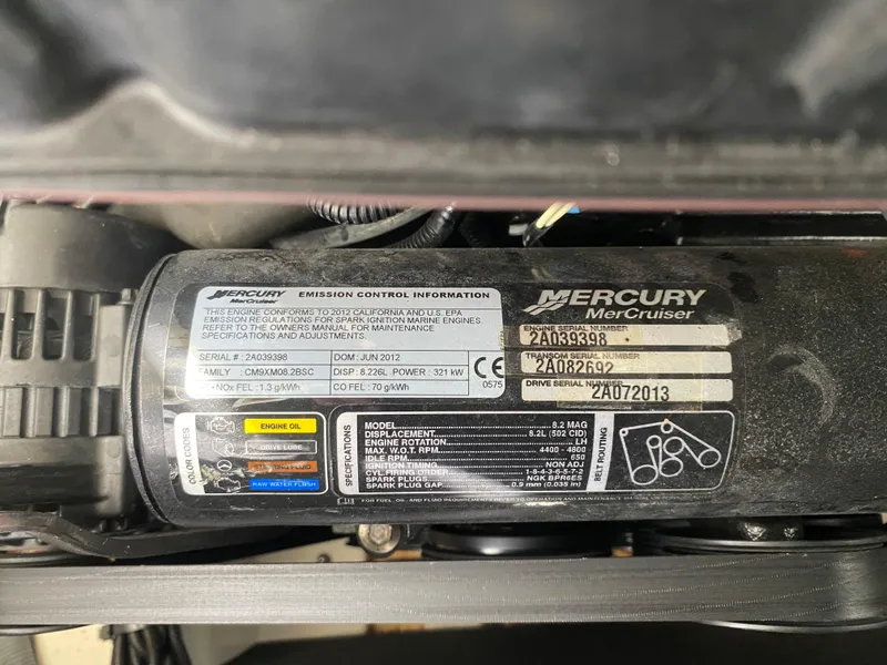 Slide: The Image of Mercury MerCruiser engine label on a 2012 Sea Ray 270 SLX boat. - 46