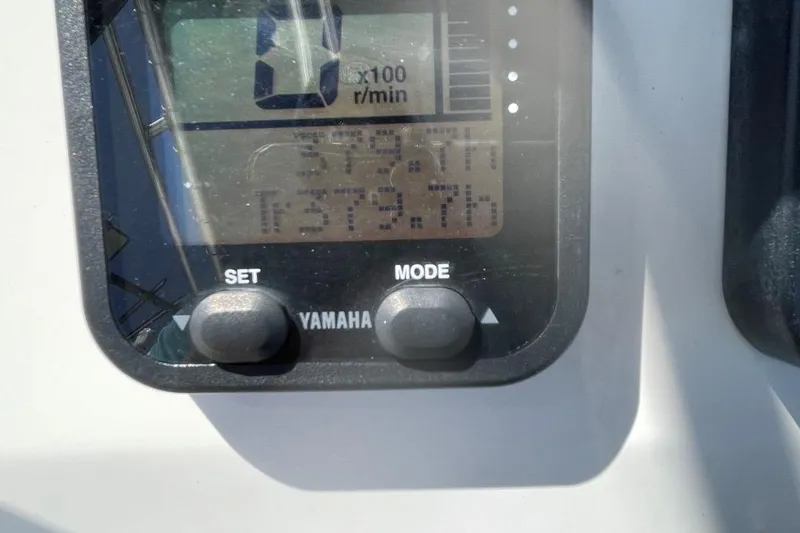 Slide: The Image of Close-up of a Yamaha boat display showing engine hours and RPM settings. - 16