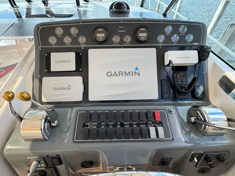 Slide: The Image of Control panel of a 2000 Tiara Yachts 4000 Express with Garmin navigation system. - 26
