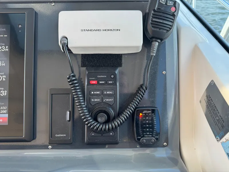 Slide: The Image of Control panel of a 2000 Tiara Yachts 4000 Express with Standard Horizon radio. - 29