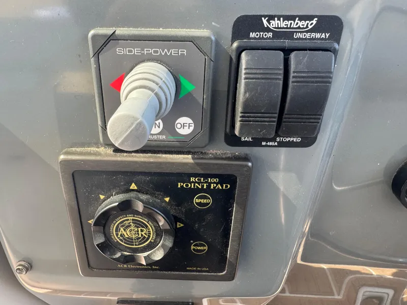 Slide: The Image of Control panel of a 2000 Tiara Yachts 4000 Express with side-power and Kahlenberg switches. - 30