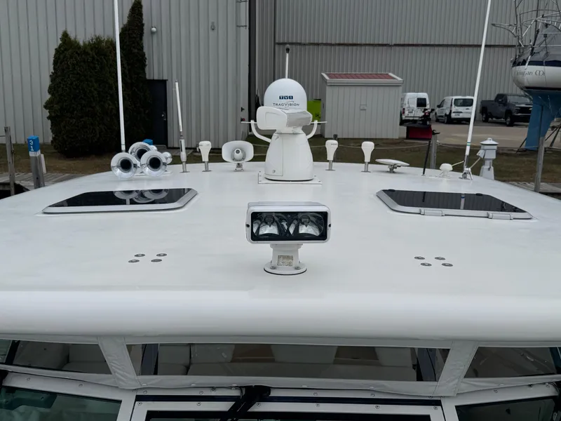 Slide: The Image of Tiara Yachts 4000 Express 2000 model with radar and hatches on deck. - 47