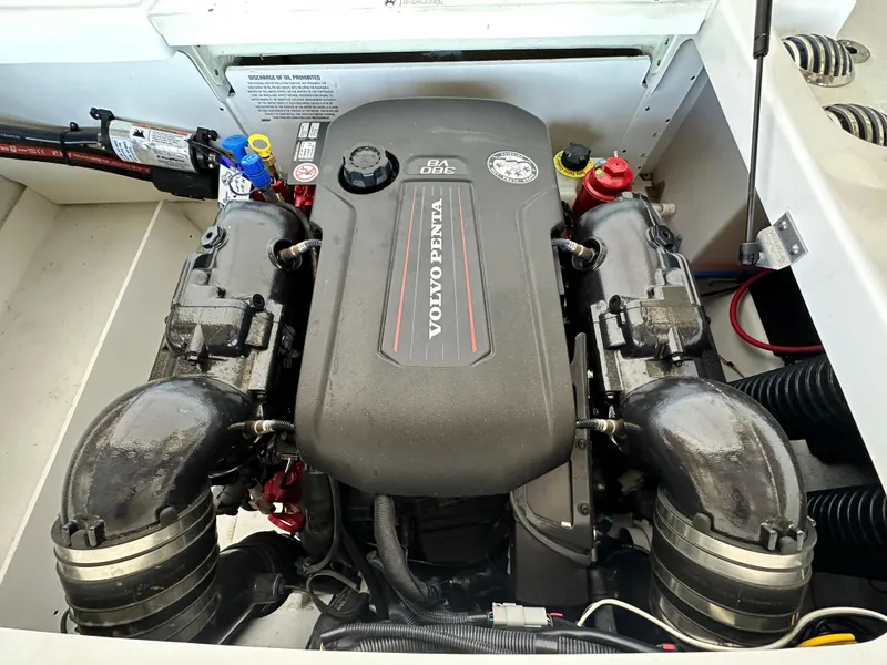 Slide: The Image of 2023 Four Winns HD8 boat engine, featuring a Volvo Penta motor. - 13