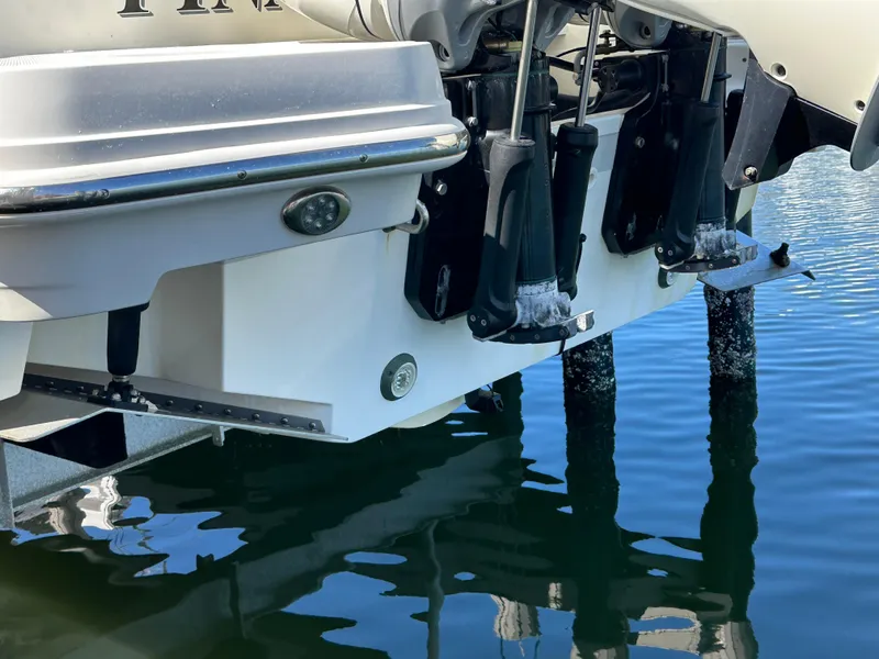 Slide: The Image of 2018 Boston Whaler 320 Vantage boat docked, showcasing sleek design and modern features. - 8