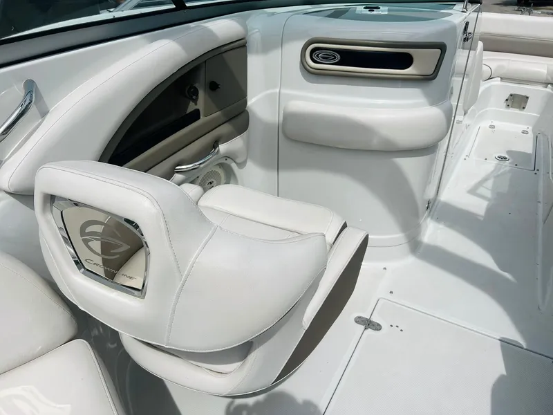 Slide: The Image of 2016 Crownline Eclipse E4 XS boat interior with white seating and sleek design. - 11