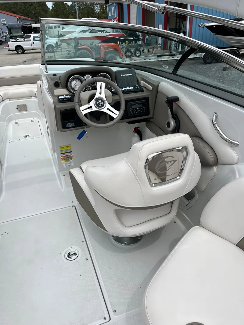 Slide: The Image of 2016 Crownline Eclipse E4 XS boat interior with steering wheel and dashboard. - 17