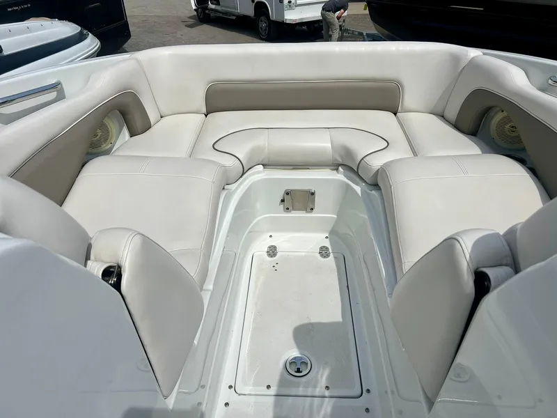 Slide: The Image of 2016 Crownline Eclipse E4 XS boat interior with spacious seating and storage. - 18
