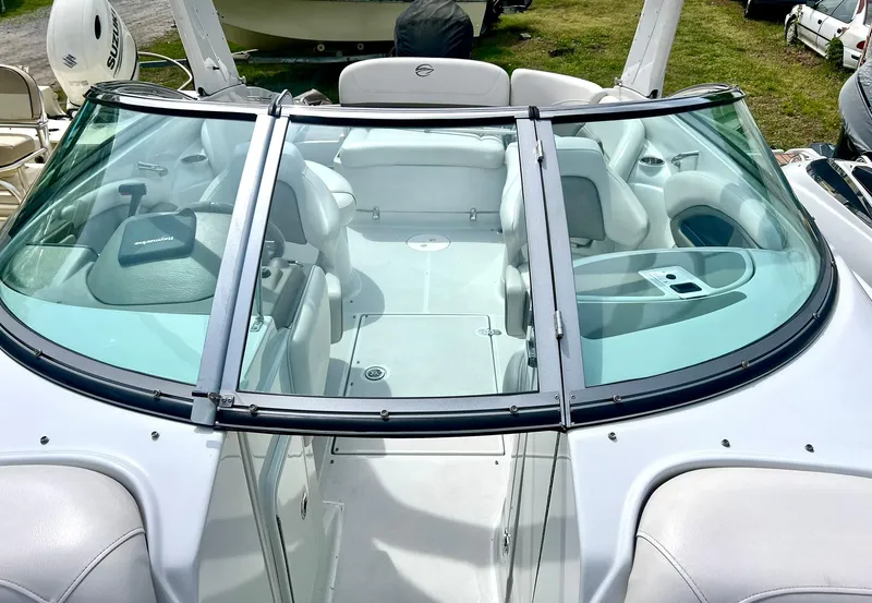 Slide: The Image of 2016 Crownline Eclipse E4 XS boat interior with seating and windshield. - 24
