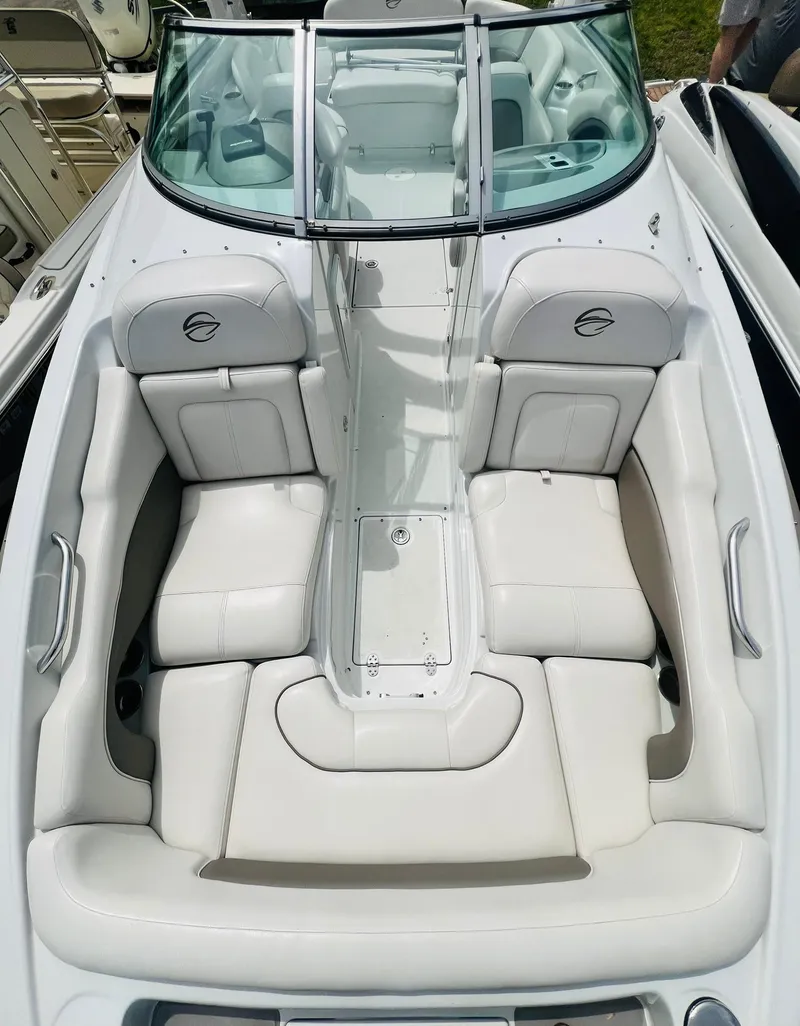 Slide: The Image of 2016 Crownline Eclipse E4 XS boat with spacious white seating and sleek design. - 25