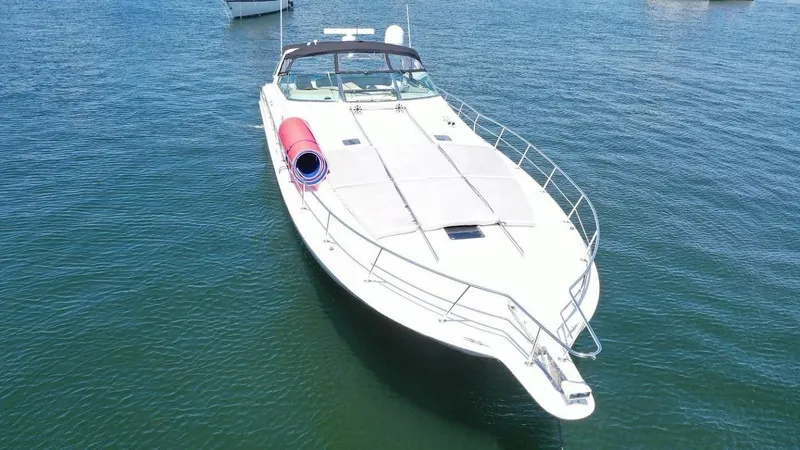 Slide: The Image of 1998 Sea Ray 500 Sundancer yacht on calm water, aerial view. - 0