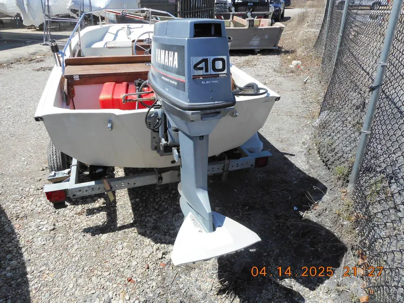 Slide: The Image of 1986 Boston Whaler 13 Super Sport with Yamaha 40 outboard motor on trailer. - 7